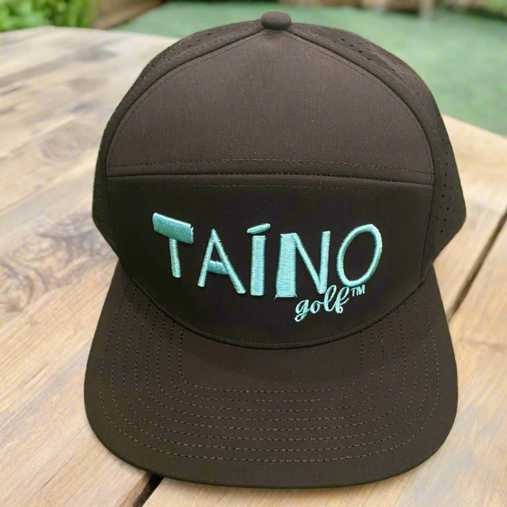Waterproof Taino Golf hat in black, designed to protect golfers from sun and rain while maintaining breathability and comfort, featuring the Taino Golf logo in teal on the front.