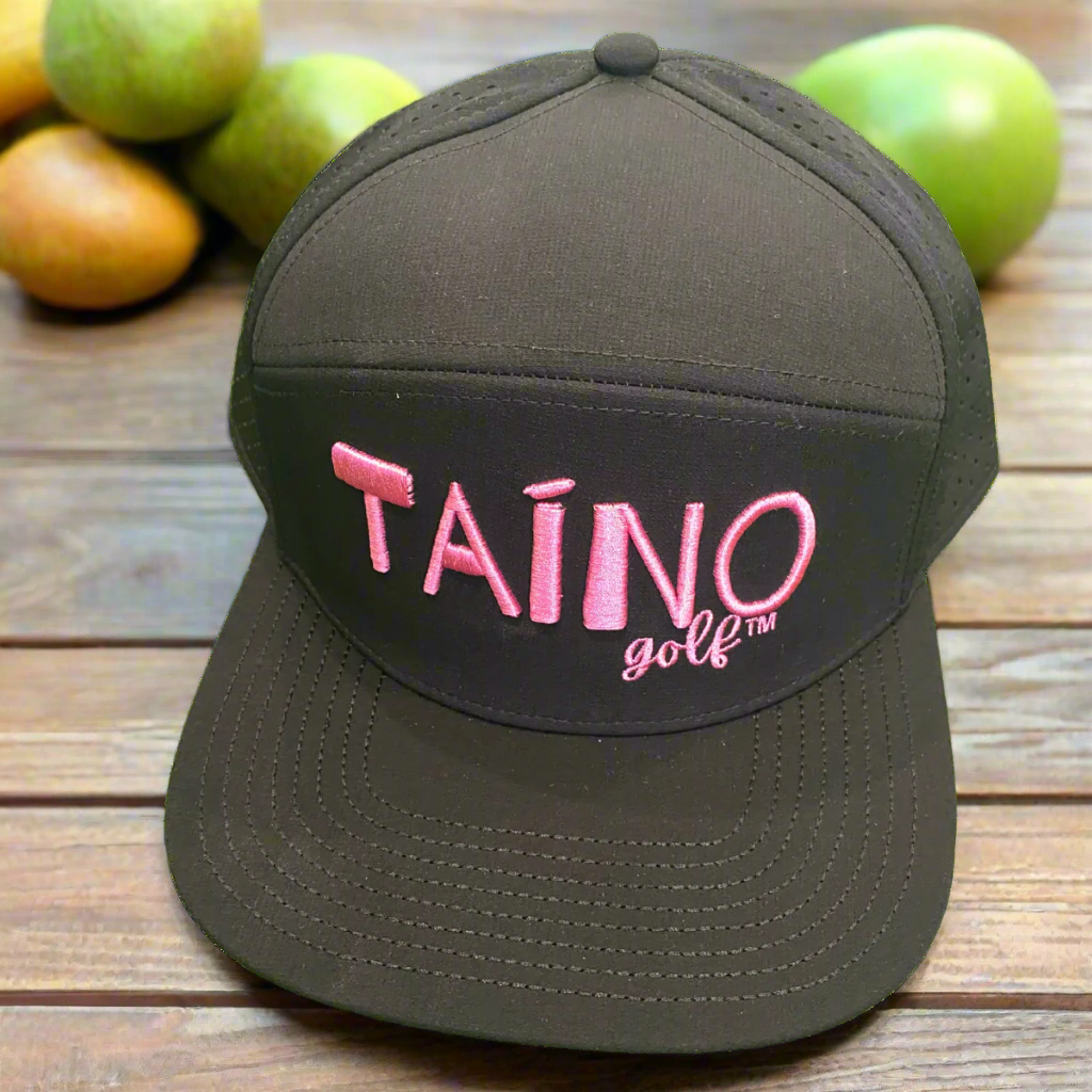 Waterproof Taino Golf hat in black, designed to protect golfers from sun and rain while maintaining breathability and comfort, featuring the Taino Golf logo in pink on the front.
